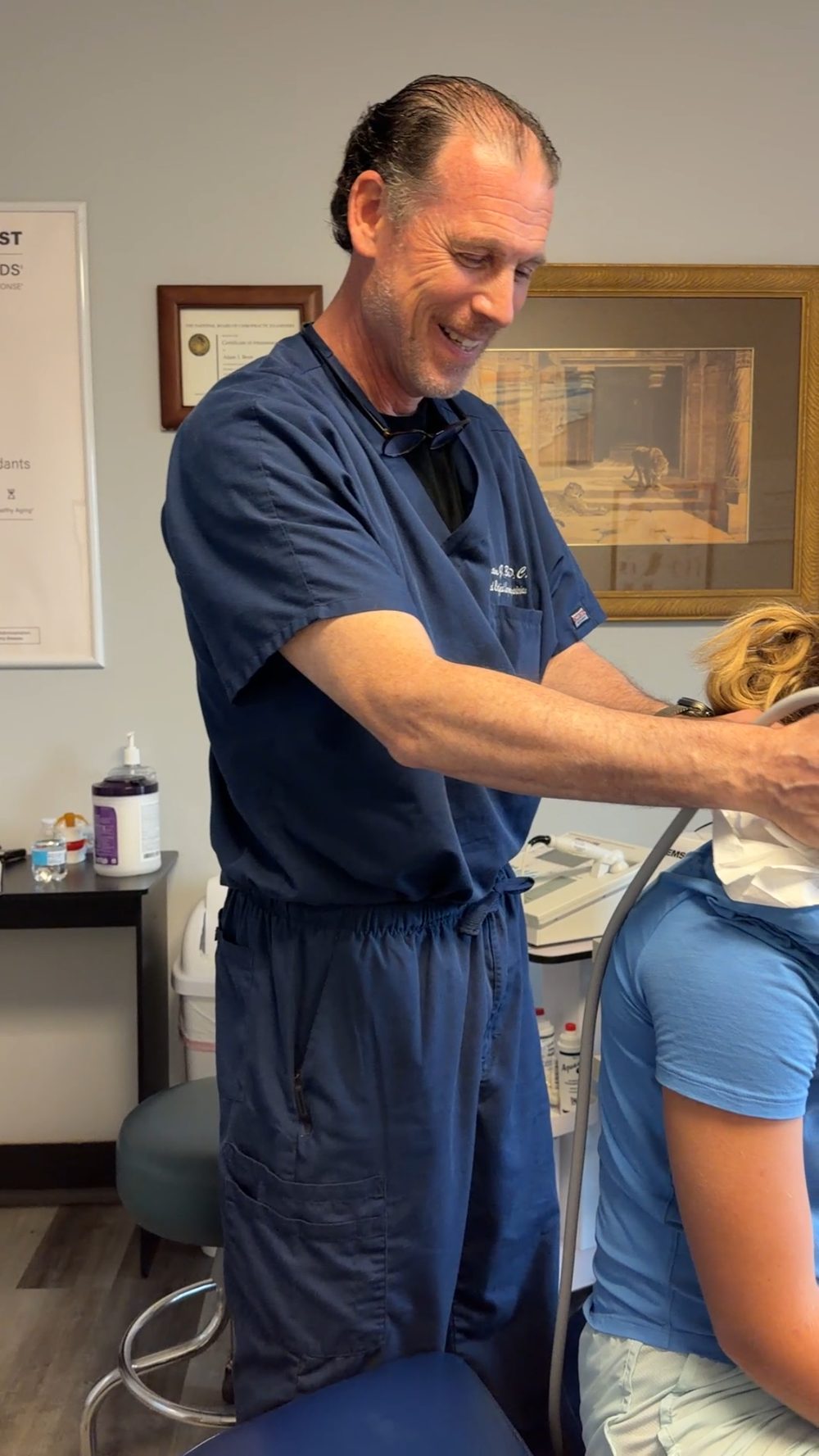 Dr. Benn of SWAVE USA treating a patient